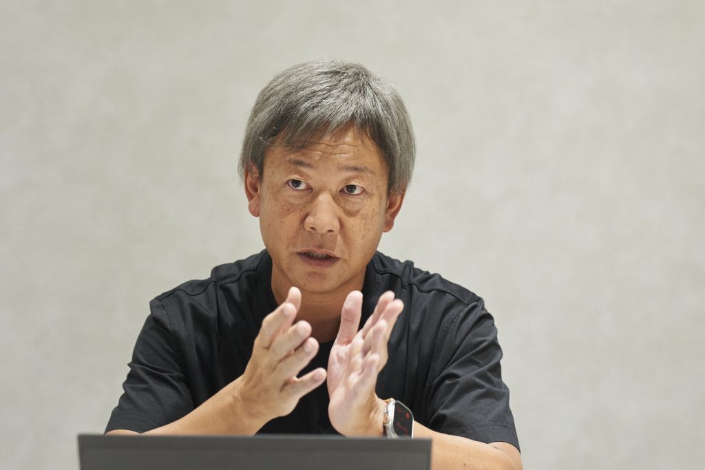 インタビューに答える野村不動産パートナーズ 新原さん