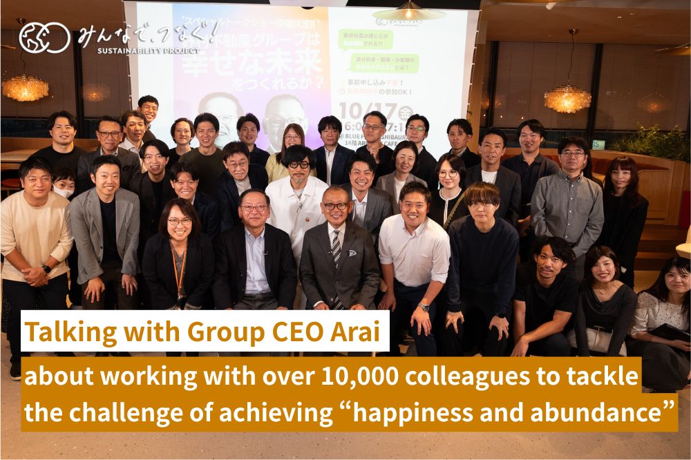 A group shot of CEO Arai, Professor Maeno, and Mr. Ohata smiling side by side